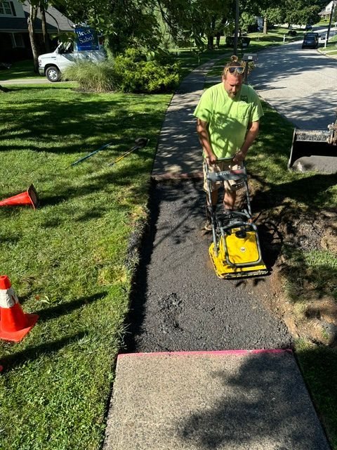 Compacting a trench after plumbing work near Washington Crossing, PA