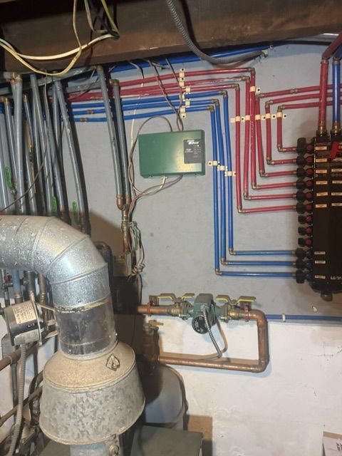 Hot water heating manifold and zone piping serviced near Washington Crossing, PA
