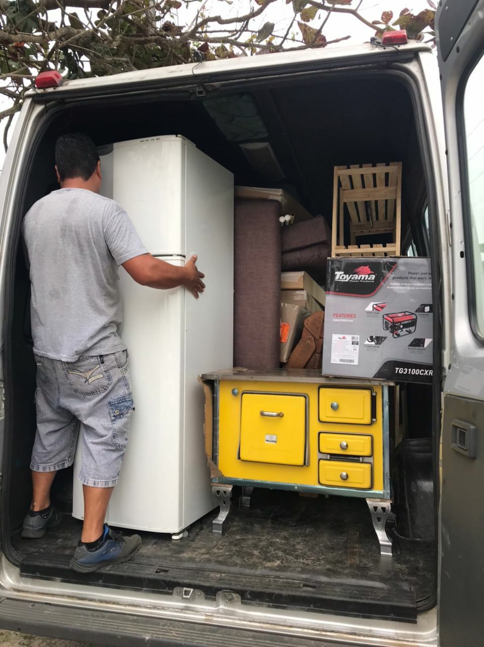 Drop The Gloves crew loading junk in Aurora, CO