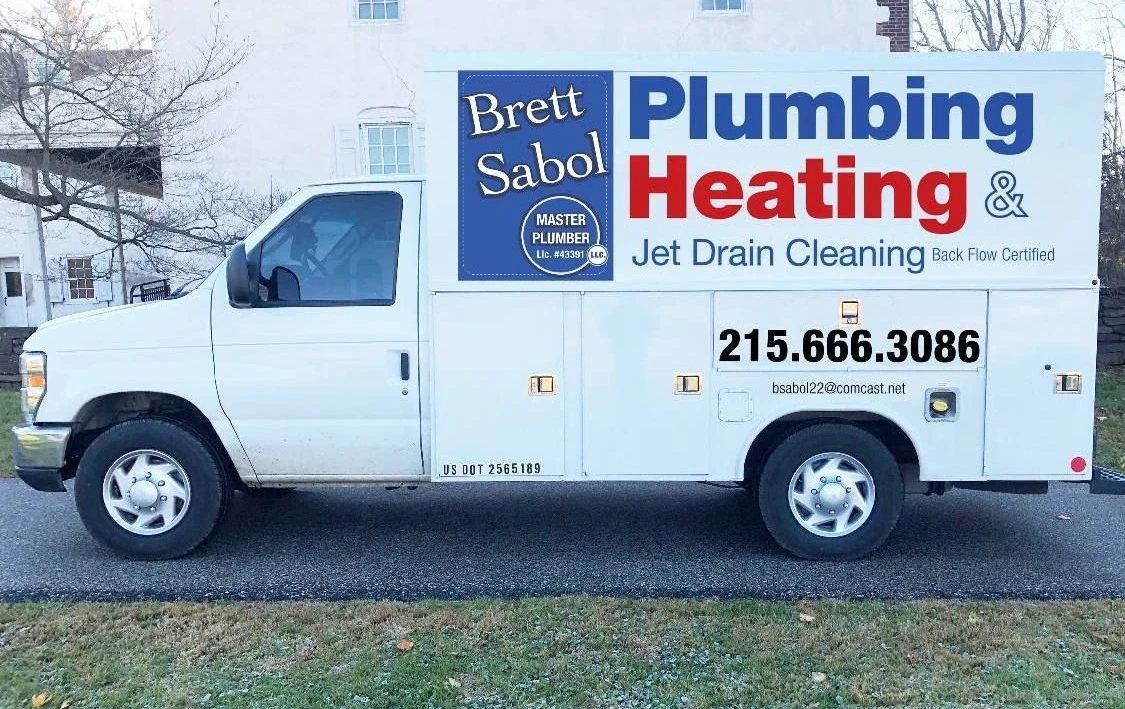 Brett Sabol Plumbing service truck, Plumbing Heating and Jet Drain Cleaning, Back Flow Certified
