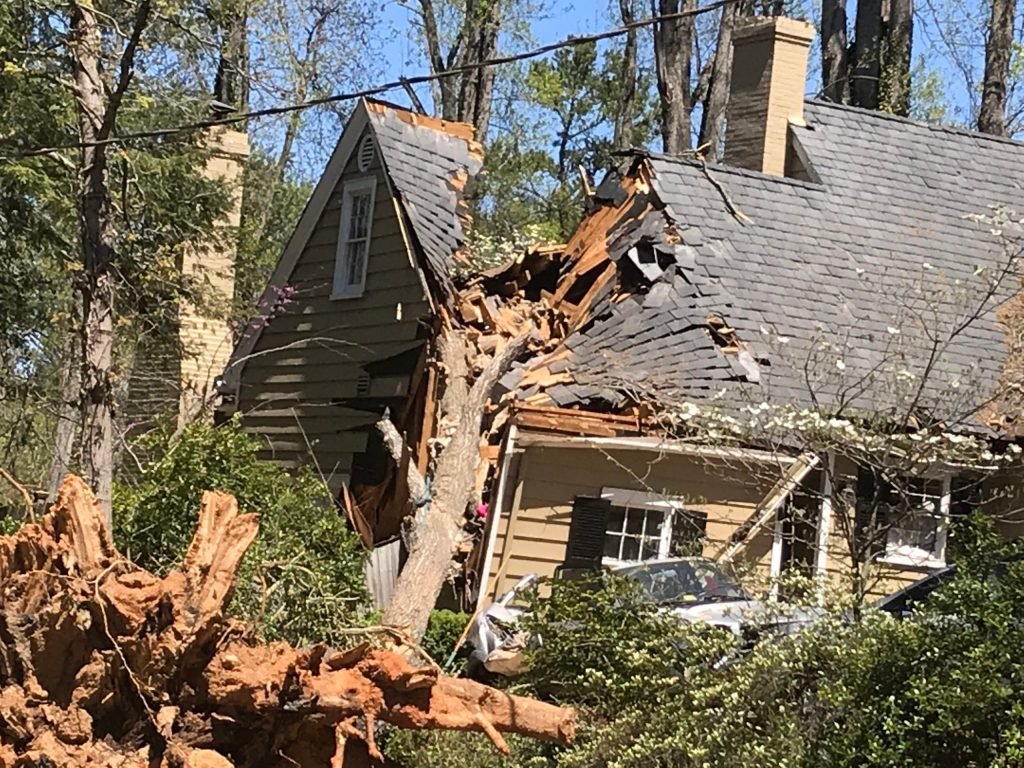 Joe Hensley public adjuster reviewing damage in Pasadena, TX